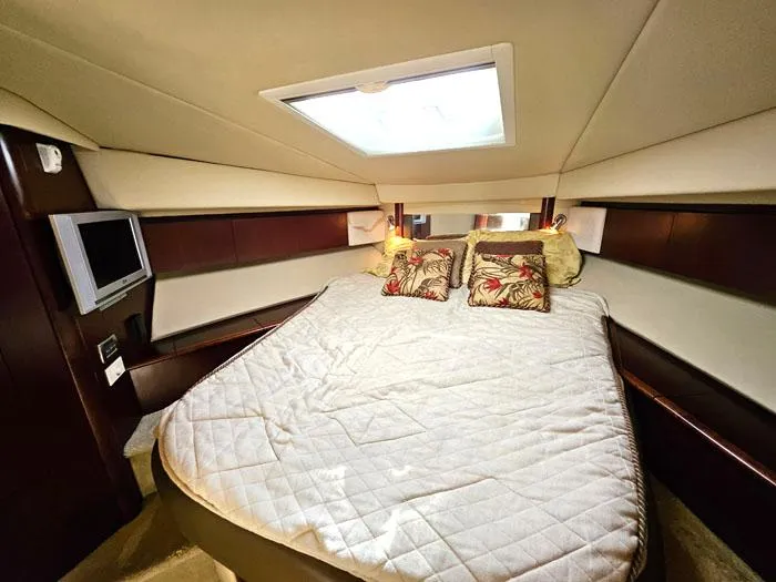  Yacht Photos Pics Luxurious bedroom interior of 2006 Sea Ray 44 Sedan Bridge yacht.