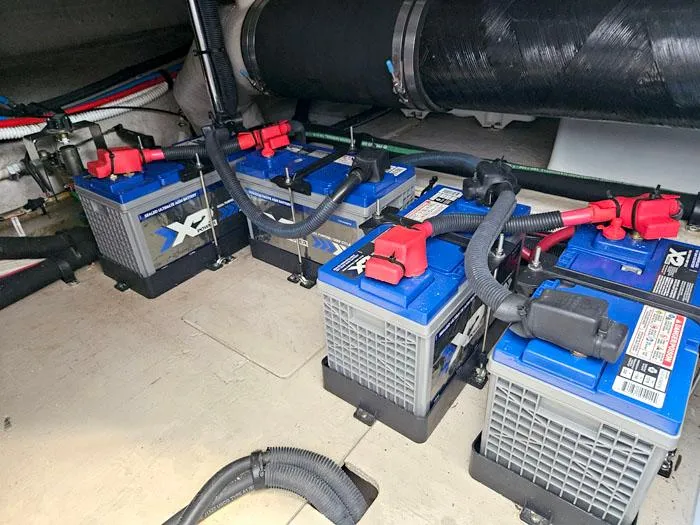  Yacht Photos Pics Battery compartment of 2006 Sea Ray 44 Sedan Bridge with multiple blue batteries.