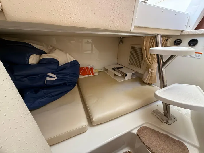  Yacht Photos Pics 2008 Hydra-Sports Vector 3500 VX cabin interior with cushions and storage space.