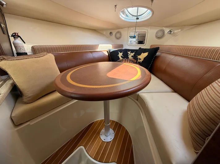  Yacht Photos Pics 2008 Hydra-Sports Vector 3500 VX cabin interior with seating and table.