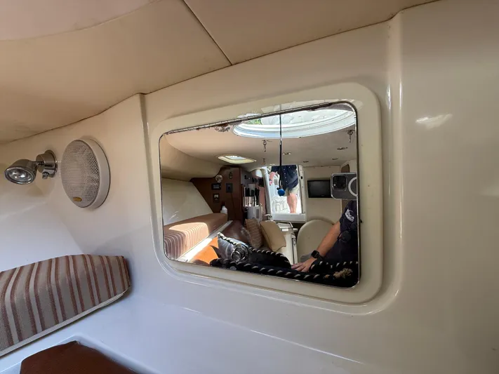  Yacht Photos Pics Interior of 2008 Hydra-Sports Vector 3500 VX boat cabin with seating and window reflection.