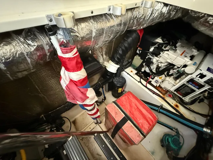  Yacht Photos Pics Engine compartment of 2008 Hydra-Sports Vector 3500 VX with equipment and storage items.