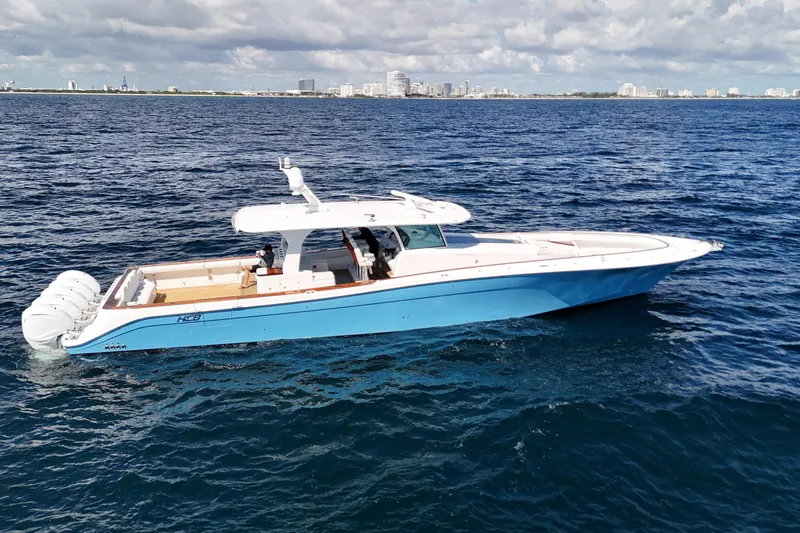 Yacht Photos Pics 2021 HCB 65 Estrella boat cruising on open water under a cloudy sky.