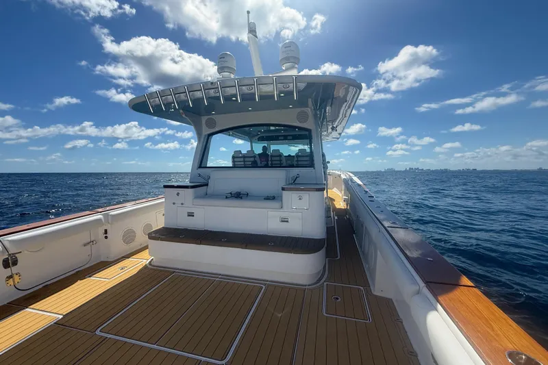  Yacht Photos Pics 2021 HCB 65 Estrella boat on open sea under clear blue sky.