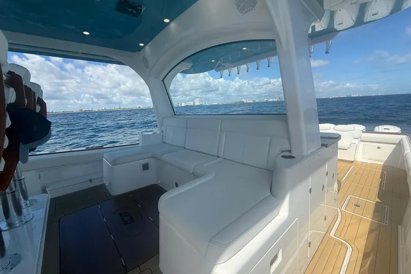  Yacht Photos Pics Luxurious 2021 HCB 65 Estrella yacht interior with white seating and ocean view.