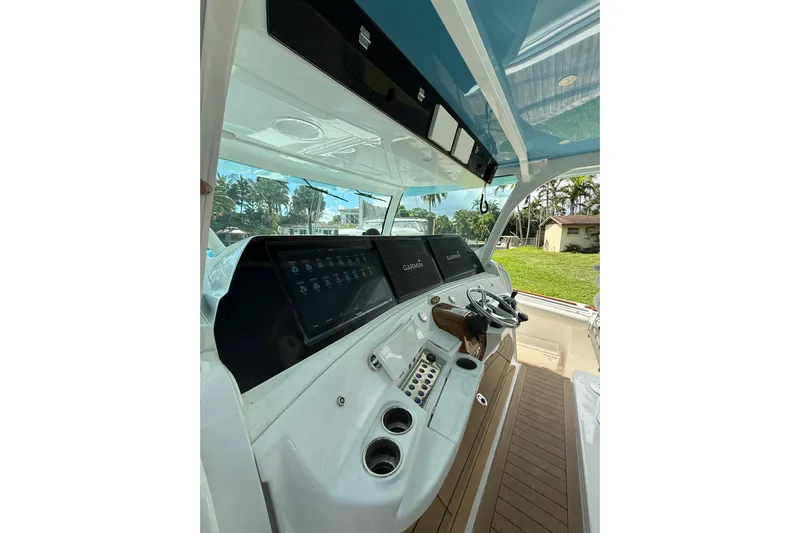  Yacht Photos Pics Helm of 2021 HCB 65 boat featuring advanced navigation systems and sleek design.