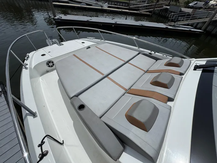 Eleven Eleven Yacht Photos Pics 2022 Beneteau Gran Turismo 32 boat with spacious sunbathing area and comfortable seating.
