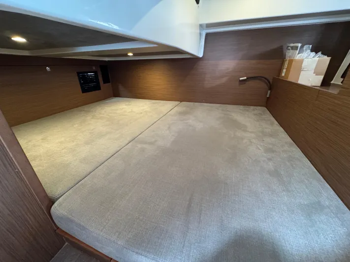 Eleven Eleven Yacht Photos Pics 2022 Beneteau Gran Turismo 32 cabin interior with spacious bed and modern design.