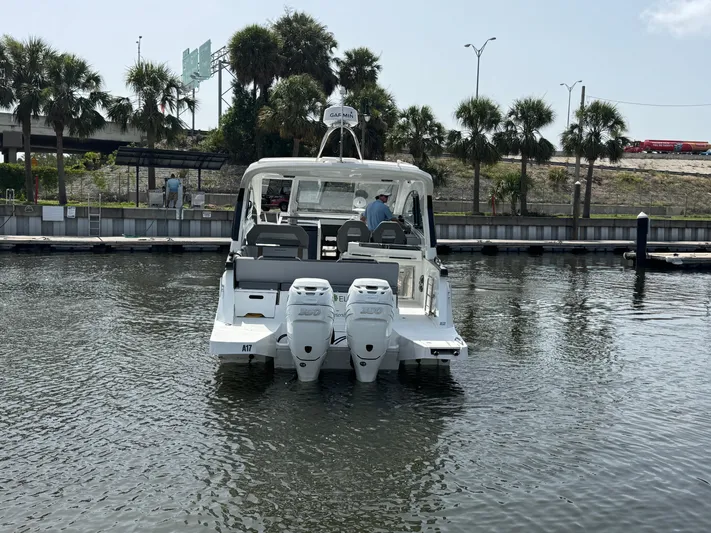 Eleven Eleven Yacht Photos Pics 2022 Beneteau Gran Turismo 32 yacht docked, featuring dual outboard engines.