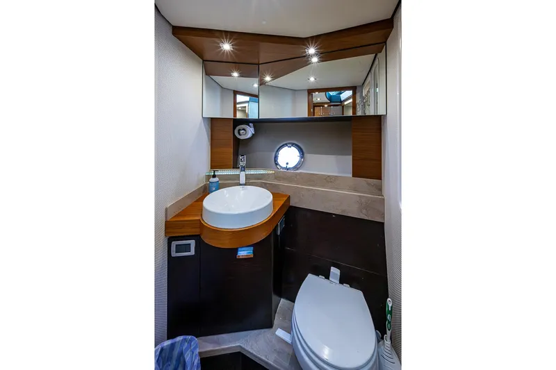Exitevent Yacht Photos Pics Luxurious 2017 Tiara Yacht coupe bathroom with modern fixtures and elegant design.