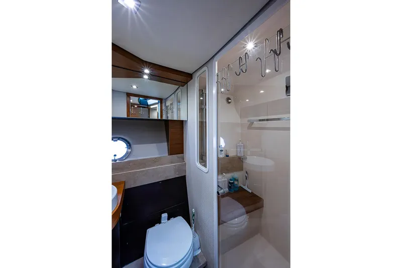 Exitevent Yacht Photos Pics Luxurious 2017 Tiara Yacht coupe bathroom with modern fixtures and elegant design.