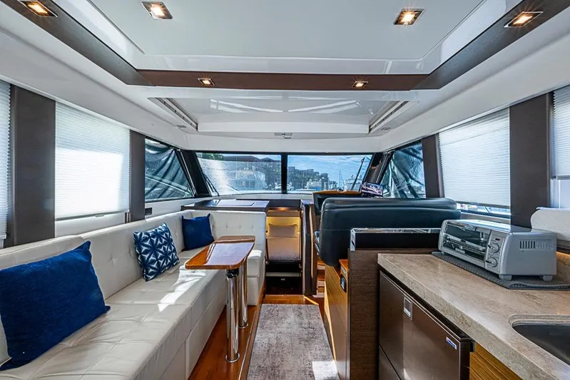 Exitevent Yacht Photos Pics Luxurious interior of 2017 Tiara Yacht coupe with modern seating and elegant design.