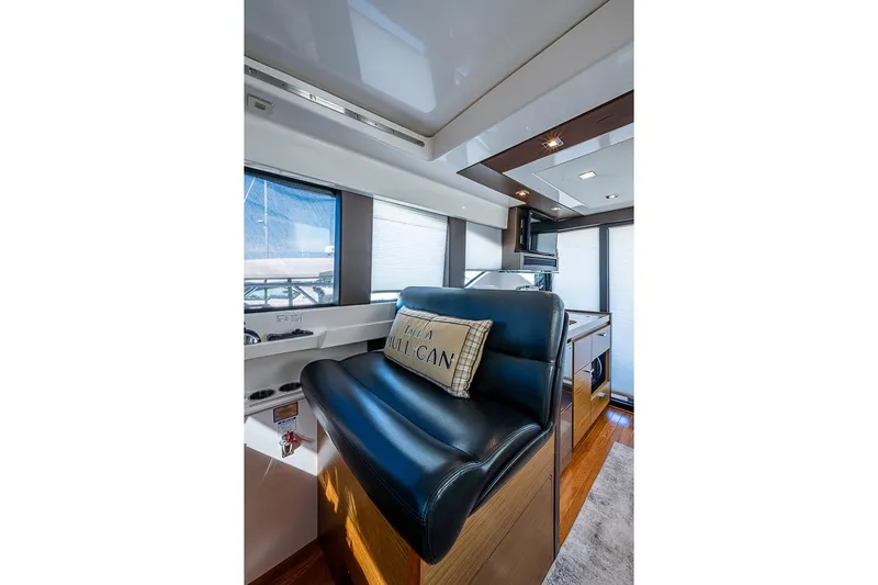 Exitevent Yacht Photos Pics Luxurious interior of 2017 Tiara Yacht coupe with plush seating and modern design.
