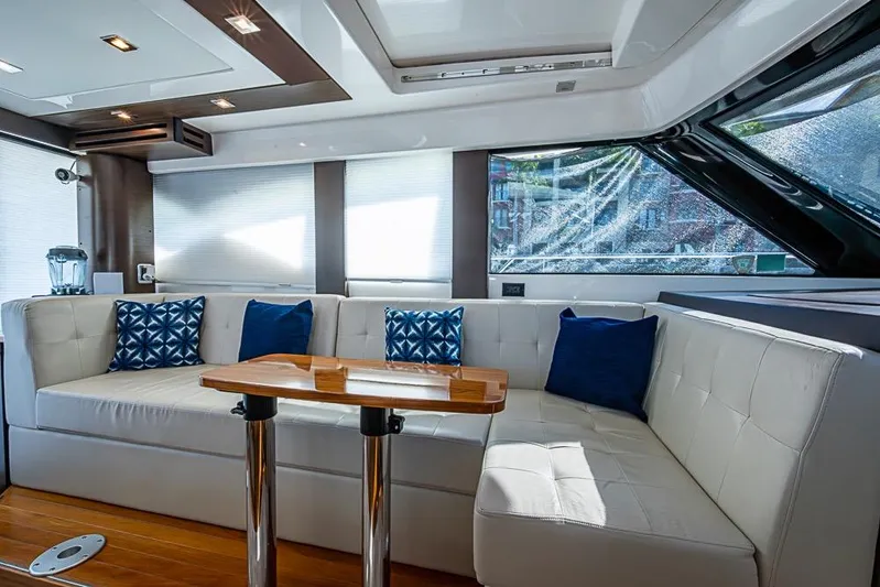 Exitevent Yacht Photos Pics Luxurious 2017 Tiara Yacht coupe interior with elegant seating and stylish decor.