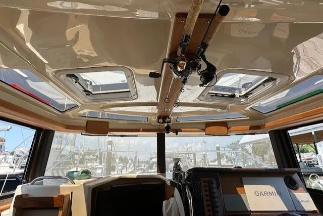  Yacht Photos Pics 2024 Ranger Tugs R-27 interior with skylights and navigation equipment.