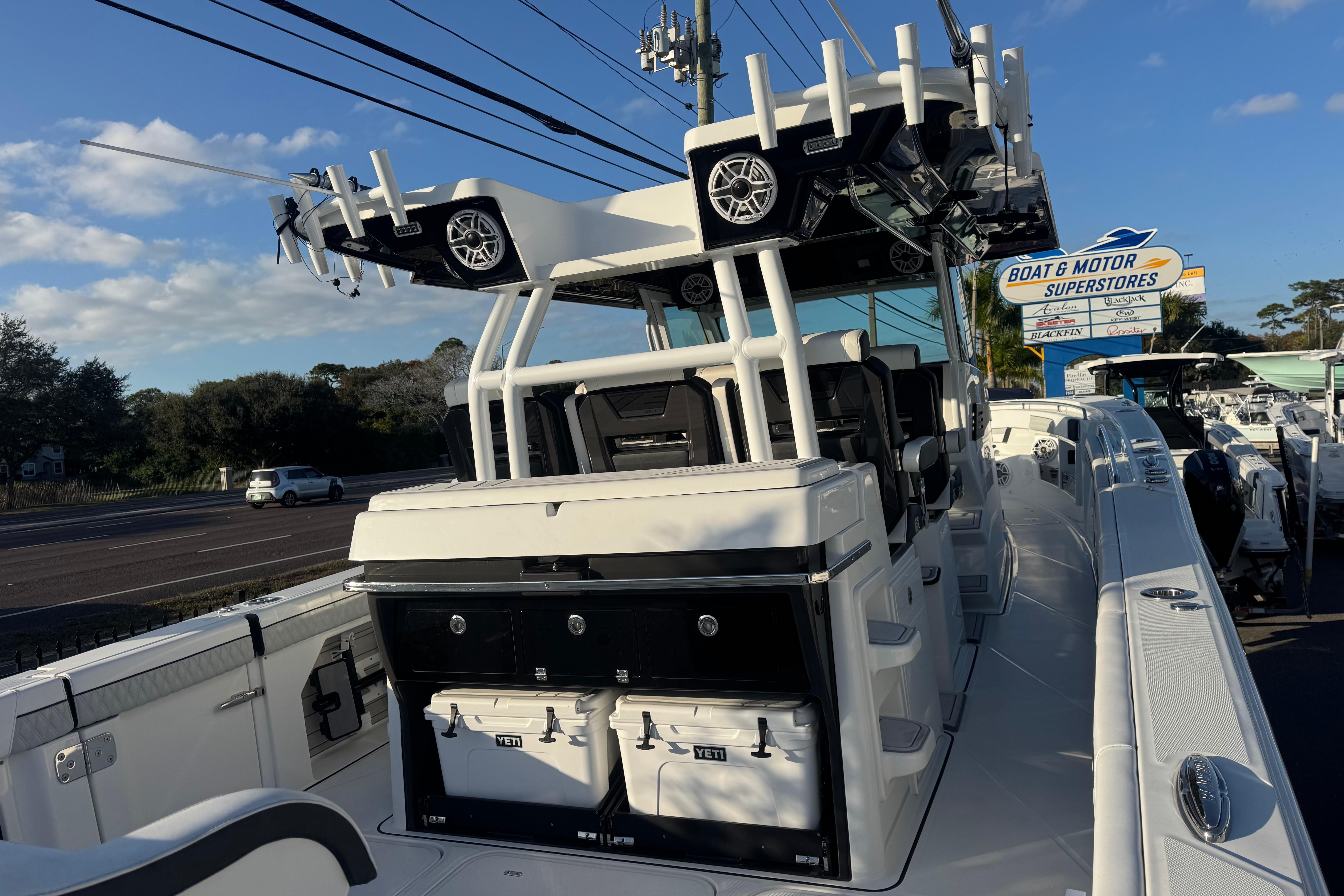 2026 Blackfin 400 CC boat at dealership, featuring modern design and equipment.