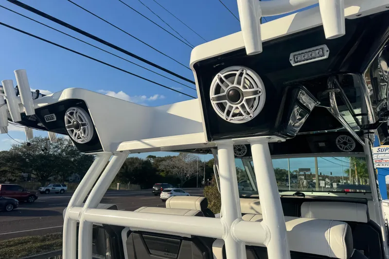  Yacht Photos Pics 2026 Blackfin 400 CC boat with speakers and rod holders, parked outdoors.