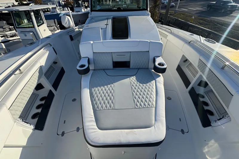  Yacht Photos Pics 2026 Blackfin 400 CC boat interior with luxurious seating and modern design.