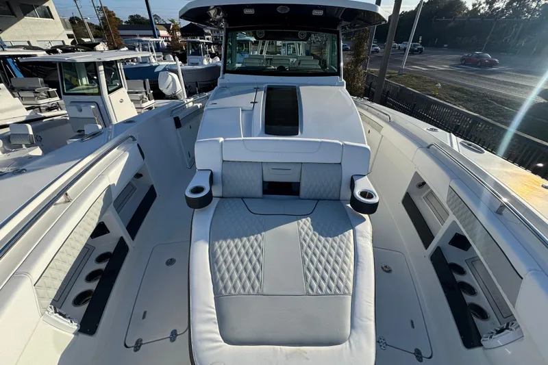  Yacht Photos Pics 2026 Blackfin 400 CC boat interior with luxurious seating and modern design.