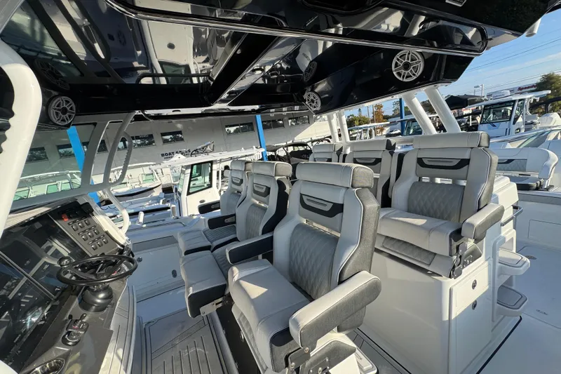 Yacht Photos Pics Interior of 2026 Blackfin 400 CC boat with luxurious seating and modern controls.