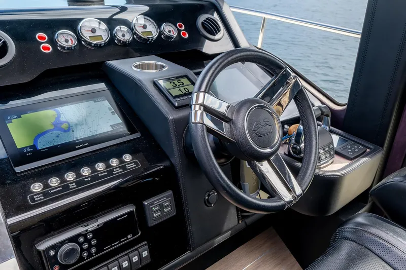 Yacht Photos Pics Helm of 2020 Cranchi E 52S Evoluzione yacht with modern navigation instruments.