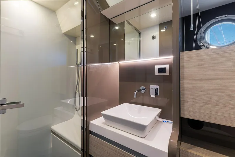  Yacht Photos Pics Modern bathroom interior on 2020 Cranchi E 52S Evoluzione yacht, featuring sleek design and fixtures.