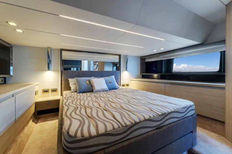  Yacht Photos Pics Luxurious bedroom interior of 2020 Cranchi E 52S Evoluzione yacht with modern design.