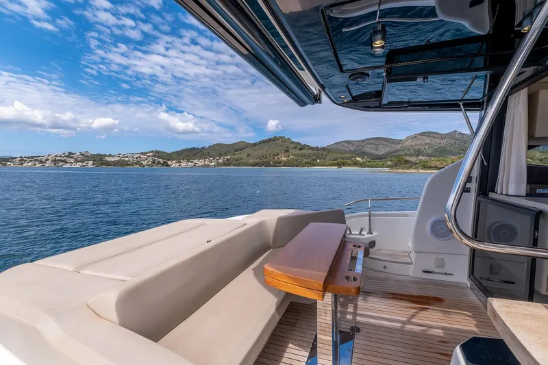  Yacht Photos Pics 2020 Cranchi E 52S Evoluzione yacht with scenic ocean and mountain view.