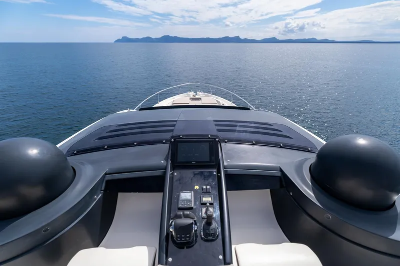  Yacht Photos Pics 2020 Cranchi E 52S Evoluzione yacht, open sea view, modern helm, distant island horizon.