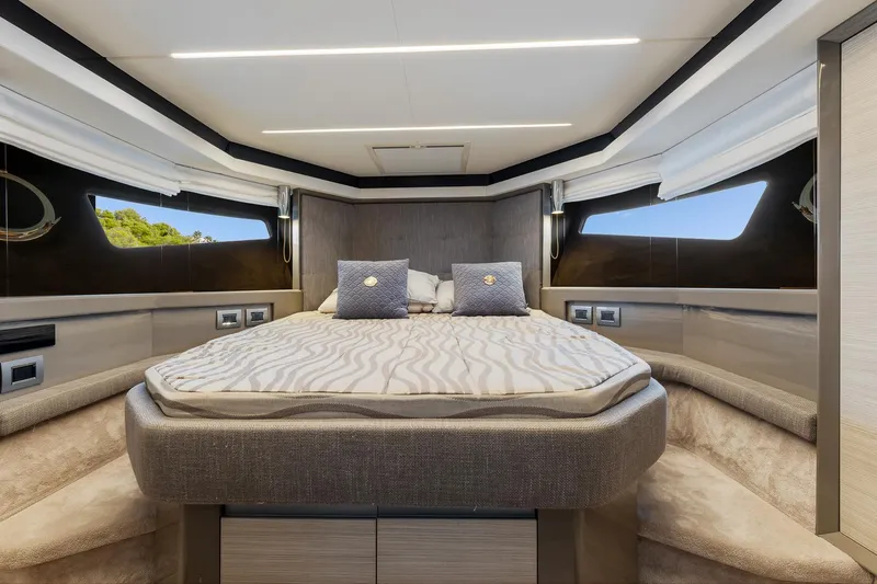  Yacht Photos Pics Luxurious bedroom interior of 2020 Cranchi E 52S Evoluzione yacht with modern design.