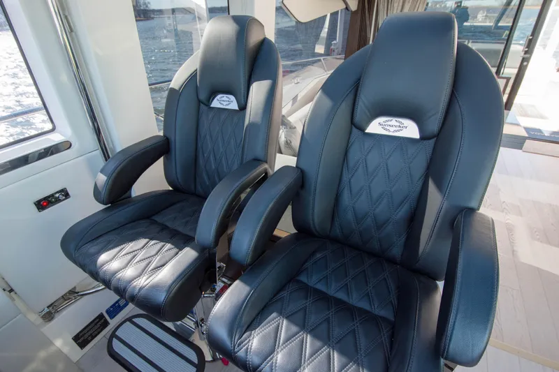  Yacht Photos Pics Luxury leather seats on 2020 Sunseeker Predator 74 XPS yacht, featuring elegant stitching.