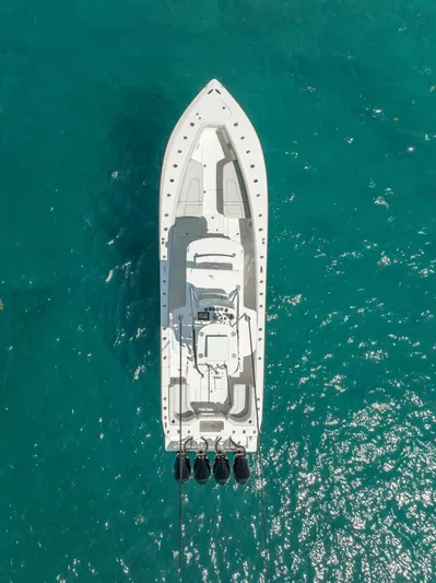 Zero Beach Yacht Photos Pics Aerial view of 2021 SeaVee 390Z boat on turquoise water.
