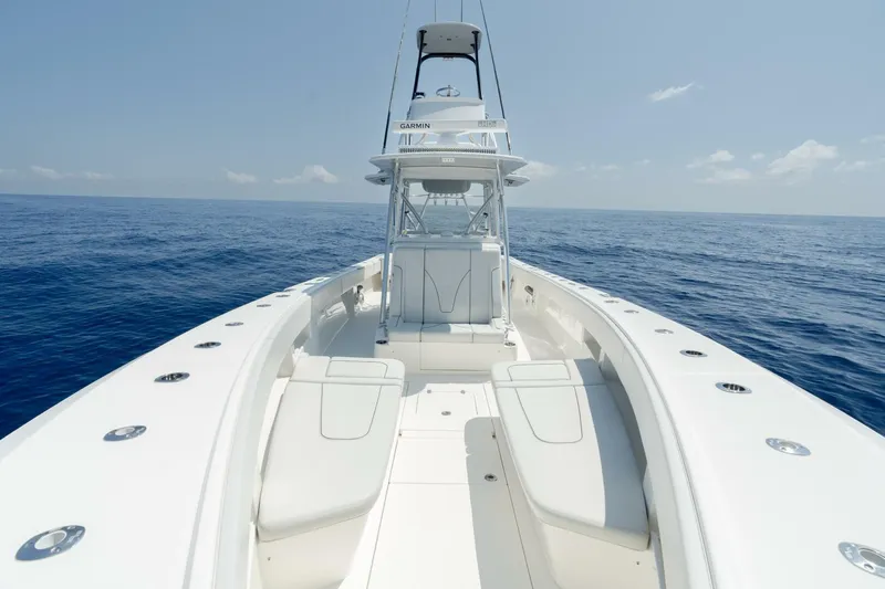 Zero Beach Yacht Photos Pics 2021 SeaVee 390Z boat on open ocean, showcasing spacious deck and sleek design.