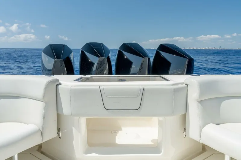 Zero Beach Yacht Photos Pics 2021 SeaVee 390Z boat with four powerful outboard engines on open sea.