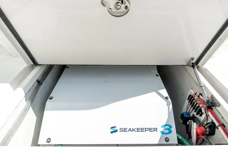 Zero Beach Yacht Photos Pics 2021 SeaVee 390Z featuring Seakeeper 3 stabilization system in storage compartment.