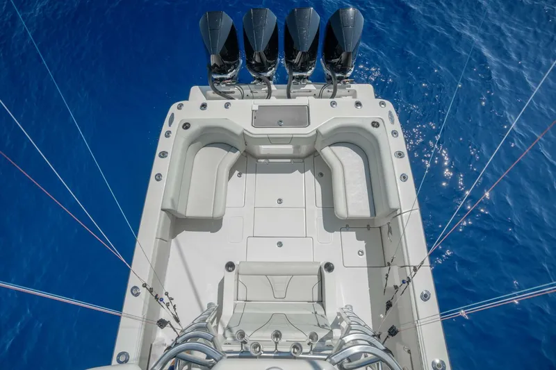 Zero Beach Yacht Photos Pics 2021 SeaVee 390Z boat with quad engines on blue ocean water.