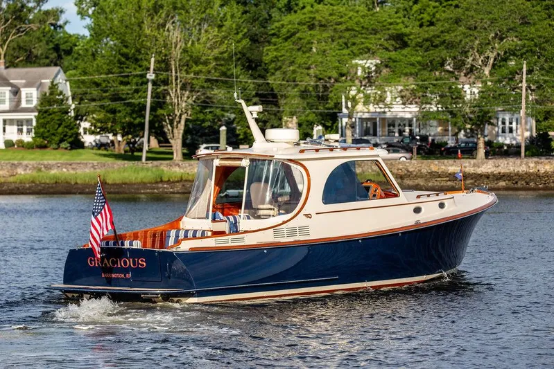 Gracious Yacht Photos Pics 2011 Hinckley Picnic Boat Mark III cruising on a scenic river.
