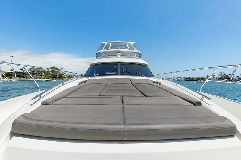 Florita Yacht Photos Pics Prestige 550 yacht 2016 model, featuring spacious sun deck on calm waters.