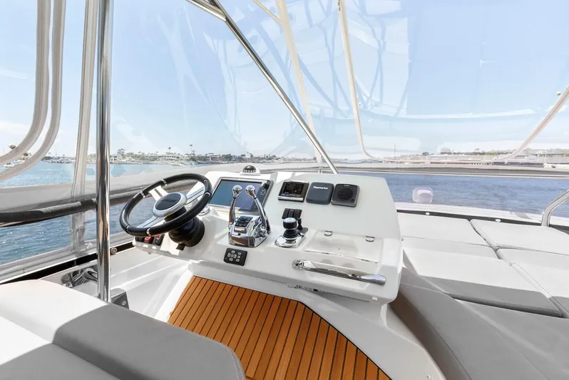 Florita Yacht Photos Pics Prestige 550 yacht helm, 2016 model, featuring sleek controls and ocean view.