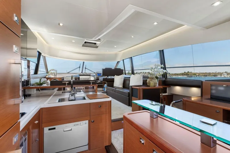 Florita Yacht Photos Pics Luxurious interior of 2016 Prestige 550 yacht with modern kitchen and seating area.