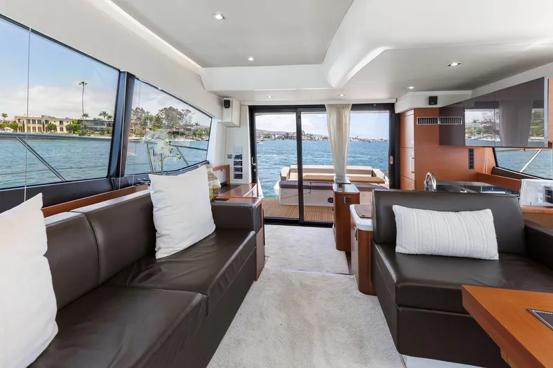 Florita Yacht Photos Pics Luxurious interior of 2016 Prestige 550 yacht with modern furnishings and waterfront view.