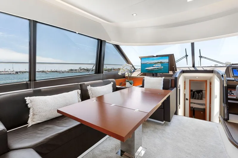 Florita Yacht Photos Pics Luxurious interior of 2016 Prestige 550 yacht with elegant seating and sea view.