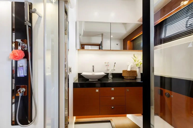 Florita Yacht Photos Pics Luxurious bathroom in 2016 Prestige 550 yacht with modern fixtures and elegant design.