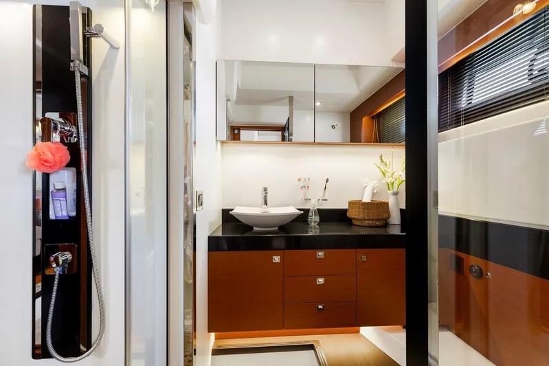 Florita Yacht Photos Pics Luxurious bathroom in 2016 Prestige 550 yacht with modern fixtures and elegant design.