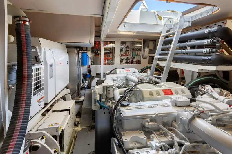 Florita Yacht Photos Pics Engine room of a 2016 Prestige 550 yacht, showcasing machinery and equipment.