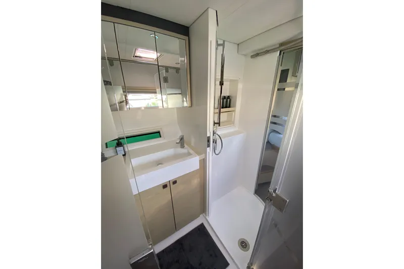 Weihaii Yacht Photos Pics Luxurious bathroom in 2023 Xquisite Yachts X5 PLUS, featuring modern fixtures and sleek design.