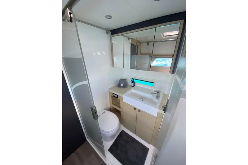 Weihaii Yacht Photos Pics Modern bathroom in 2023 Xquisite Yachts X5 PLUS, featuring sleek design and ocean view.