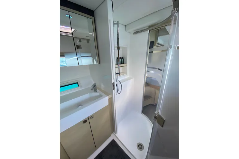 Weihaii Yacht Photos Pics Luxurious bathroom in 2023 Xquisite Yachts X5 PLUS, featuring modern fixtures and sleek design.