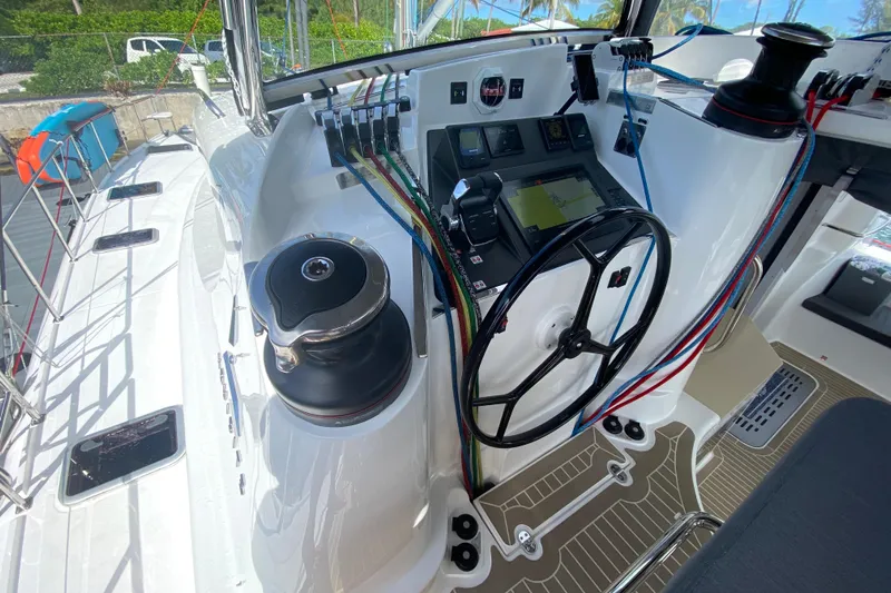 Weihaii Yacht Photos Pics 2023 Xquisite Yachts X5 PLUS helm with navigation controls and colorful ropes.