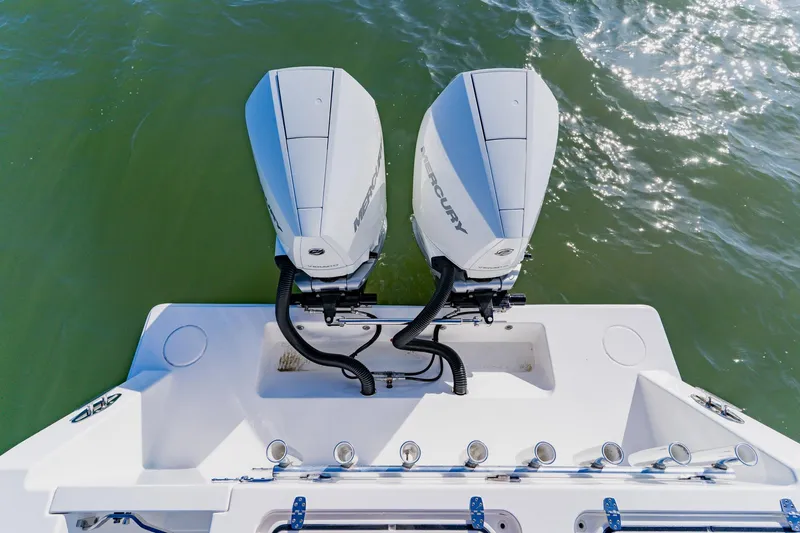  Yacht Photos Pics Twin Mercury outboard engines on 2025 Contender 32 ST boat, viewed from above.
